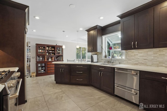 4 Franklin Ct, East Brunswick, NJ 08816 - kitchen with a peninsula, stainless steel appliances, light countertops, dark brown cabinets, and decorative backsplash