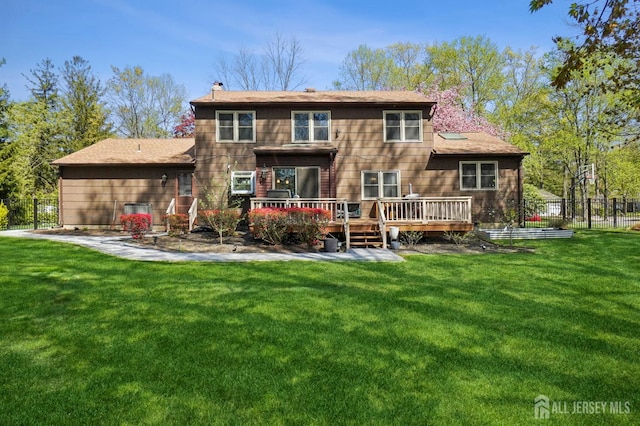 4 Franklin Ct, East Brunswick, NJ 08816 - rear view of property with a chimney and a deck