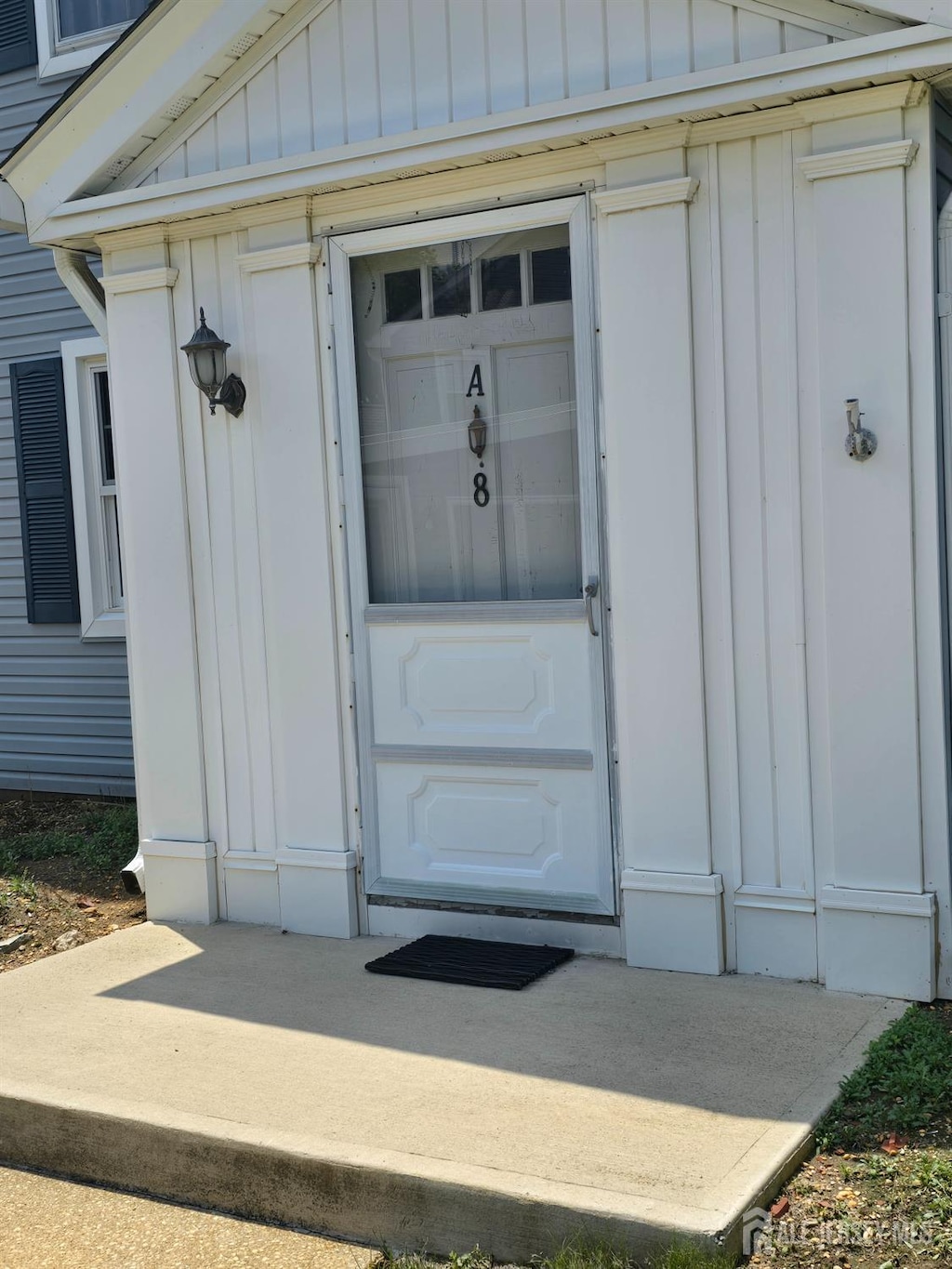 8 Sussex Way Unit A, Monroe, NJ 08831 - property entrance with board and batten siding