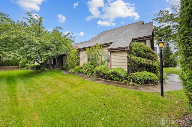 31 Ingram Dr, Monroe, NJ 08831 - view of property exterior with a lawn