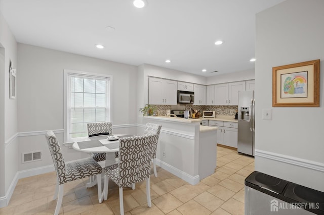 31 Ingram Dr, Monroe, NJ 08831 - dining space featuring light tile patterned floors and recessed lighting