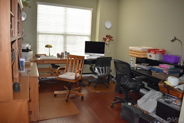 home office with wood-type flooring