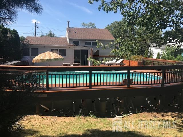 view of pool with a deck