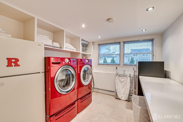 laundry area featuring separate washer and dryer and baseboard heating