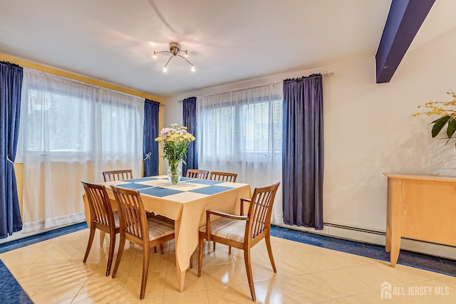 dining room with beam ceiling, light tile patterned floors, and an inviting chandelier