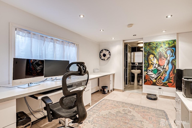 office area with light tile patterned floors