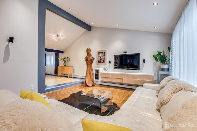 living room featuring lofted ceiling with beams, wood-type flooring, and baseboard heating