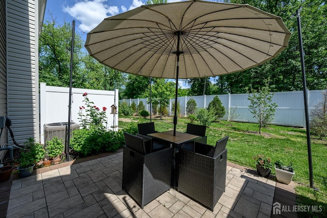 45 Athens Way, Aberdeen, NJ 07721 - fenced backyard featuring a patio area and outdoor dining space