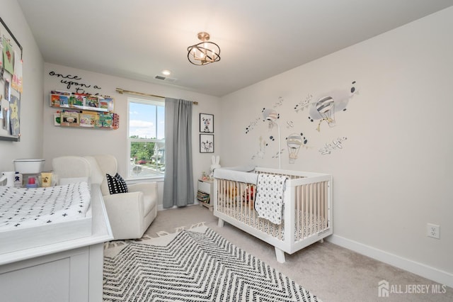 45 Athens Way, Aberdeen, NJ 07721 - carpeted bedroom featuring a nursery area and baseboards