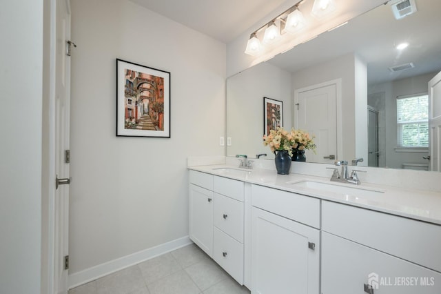 45 Athens Way, Aberdeen, NJ 07721 - bathroom featuring double vanity, an enclosed shower, and tile patterned floors