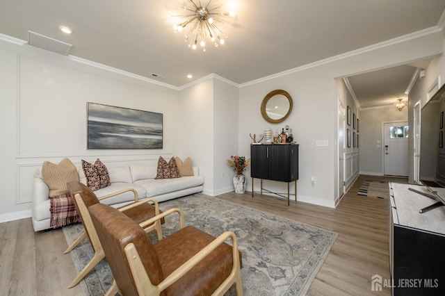 45 Athens Way, Aberdeen, NJ 07721 - living area featuring a chandelier, light wood-style flooring, crown molding, and recessed lighting