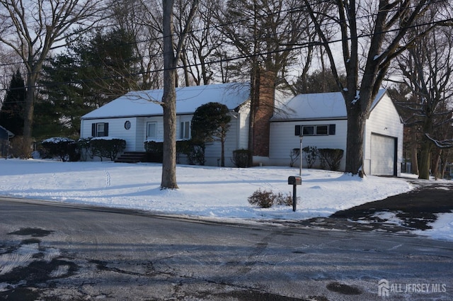 single story home with a garage