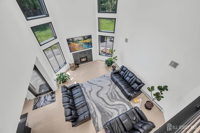 36 School Rd E, Marlboro, NJ 07746 - living room featuring a premium fireplace and a high ceiling