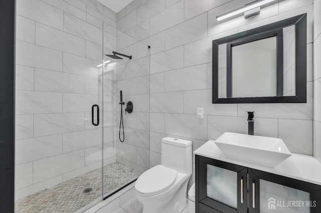 36 School Rd E, Marlboro, NJ 07746 - full bath featuring a stall shower, vanity, and tile walls