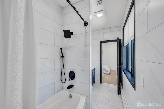36 School Rd E, Marlboro, NJ 07746 - bathroom with shower / tub combo, ensuite bathroom, and tile walls