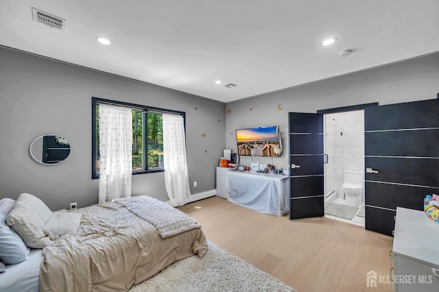 36 School Rd E, Marlboro, NJ 07746 - bedroom featuring wood finished floors, recessed lighting, and ensuite bath