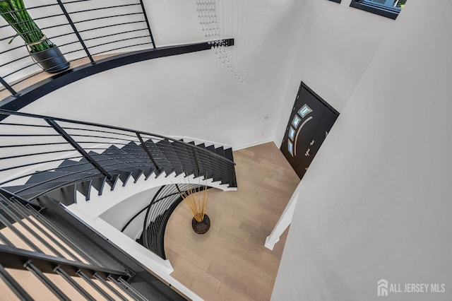 36 School Rd E, Marlboro, NJ 07746 - staircase with wood finished floors and a high ceiling