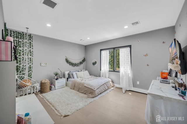 36 School Rd E, Marlboro, NJ 07746 - bedroom with light wood finished floors and recessed lighting