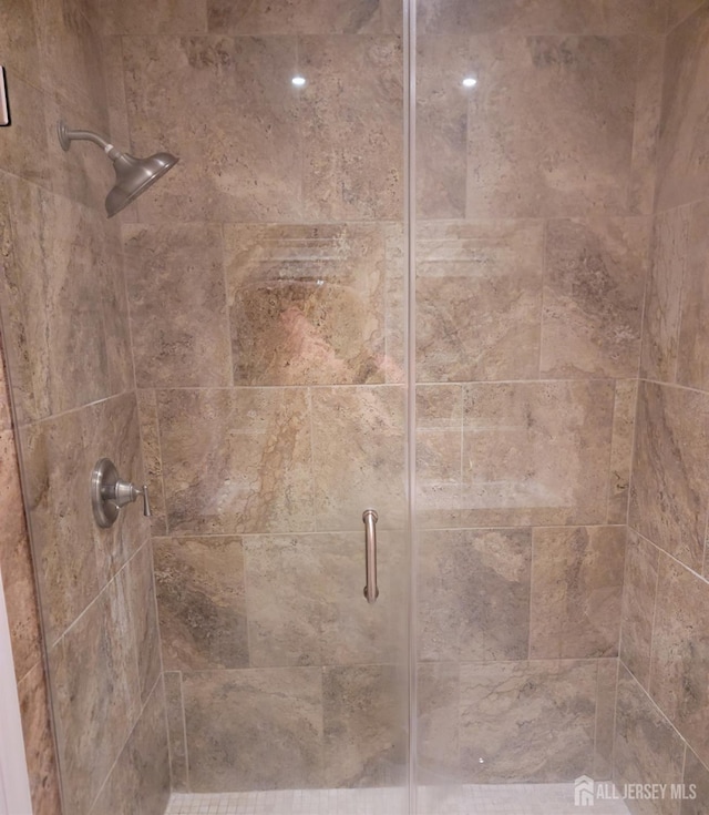details featuring a shower stall