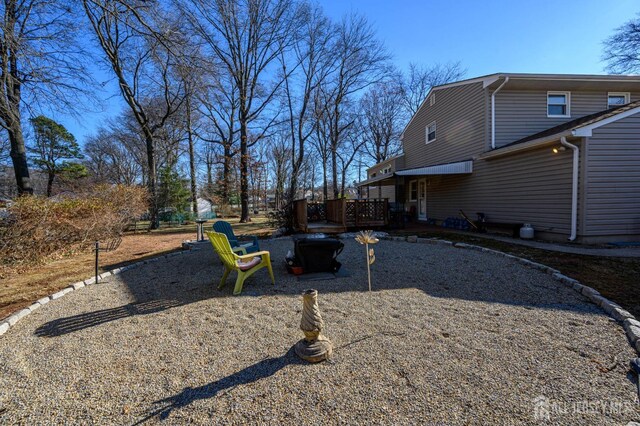 view of yard featuring a deck