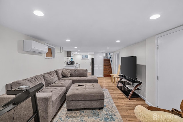 425 Grove Ave, Metuchen, NJ 08840 - living area with a wall unit AC, light wood-style floors, recessed lighting, stairs, and baseboards