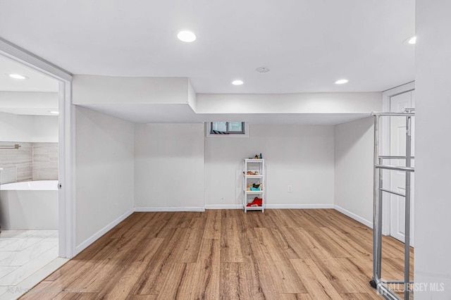 425 Grove Ave, Metuchen, NJ 08840 - finished below grade area featuring wood finished floors, baseboards, and recessed lighting