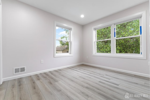 763 Gadek Pl, Perth Amboy, NJ 08861 - empty room with baseboards, light wood finished floors, and recessed lighting