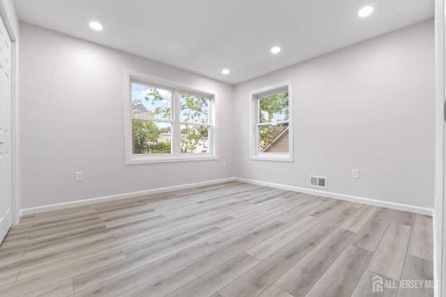 763 Gadek Pl, Perth Amboy, NJ 08861 - empty room with light wood finished floors, plenty of natural light, recessed lighting, and baseboards