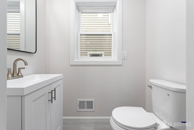 763 Gadek Pl, Perth Amboy, NJ 08861 - half bath featuring toilet, vanity, and baseboards