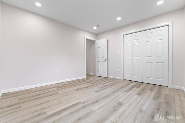 763 Gadek Pl, Perth Amboy, NJ 08861 - unfurnished bedroom featuring light wood-type flooring, baseboards, recessed lighting, and a closet