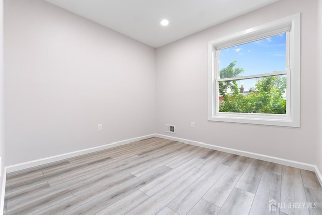 763 Gadek Pl, Perth Amboy, NJ 08861 - empty room featuring light wood-type flooring, baseboards, and recessed lighting
