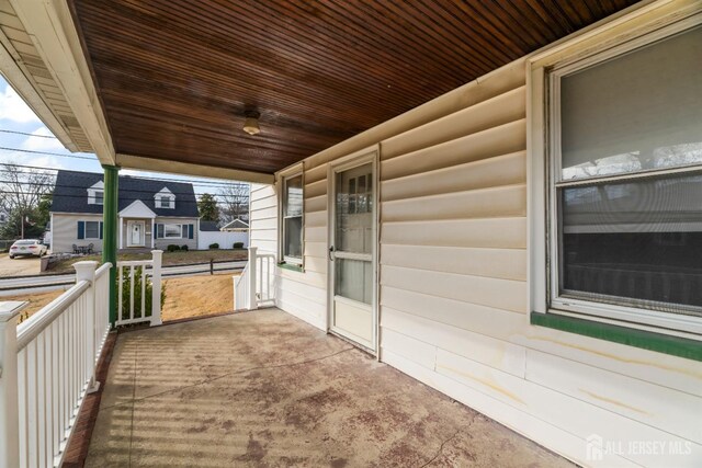 view of patio featuring a porch