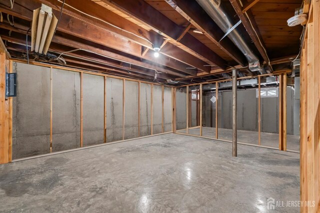 basement with electric panel