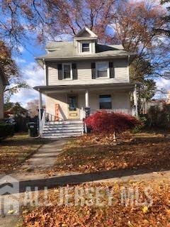 view of front property with covered porch