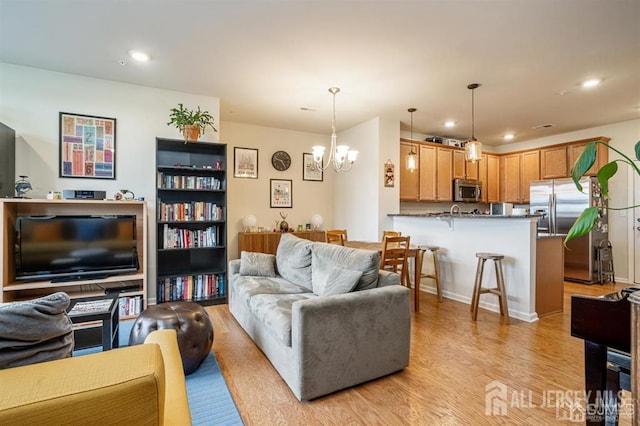 1515 NE Hudson Cir Unit 1515, Highland Park, NJ 08904 - living room with light wood-style flooring, a chandelier, and recessed lighting