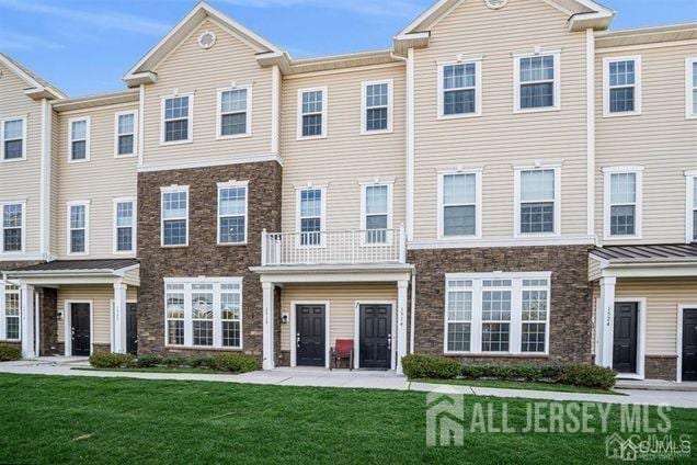 1515 NE Hudson Cir Unit 1515, Highland Park, NJ 08904 - view of front of property with a front lawn and stone siding