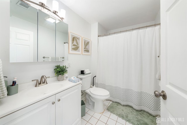 full bath with tile patterned flooring, toilet, and vanity