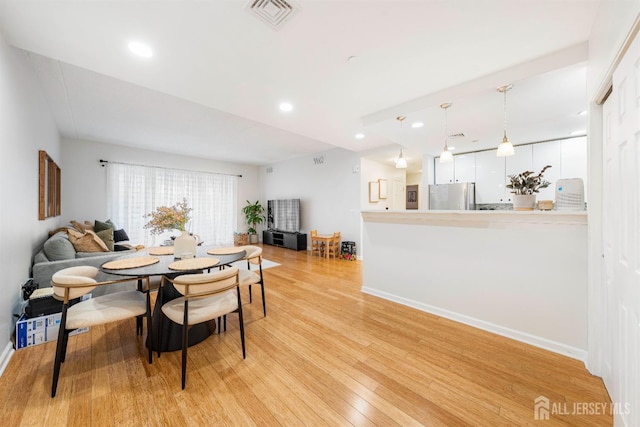 358 Rector St Unit 406, Perth Amboy, NJ 08861 - dining area with light wood-type flooring and recessed lighting