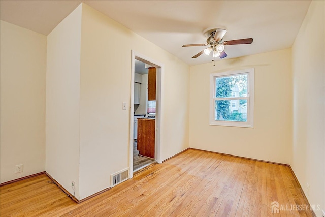 8 Macarthur Dr, Edison, NJ 08837 - unfurnished room with light wood-style floors and ceiling fan