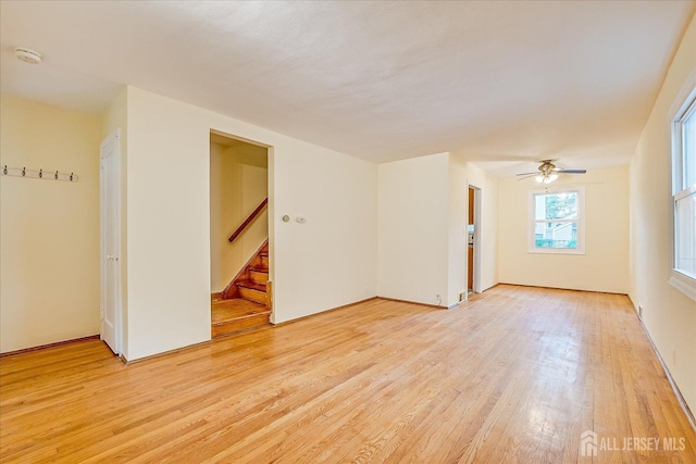 8 Macarthur Dr, Edison, NJ 08837 - spare room featuring a smoke detector, light wood finished floors, stairs, and ceiling fan