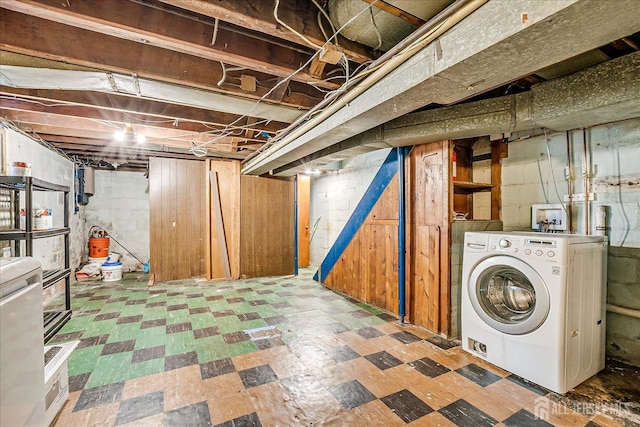 8 Macarthur Dr, Edison, NJ 08837 - unfinished below grade area featuring washer / clothes dryer and tile patterned floors