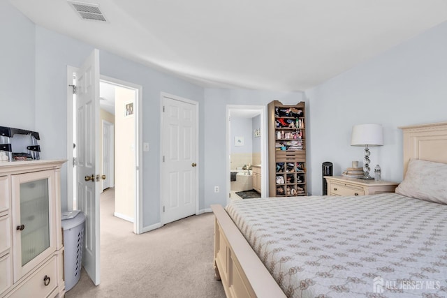 12 Jeremy Way, Old Bridge, NJ 08857 - bedroom with light colored carpet, ensuite bathroom, and baseboards