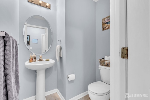 12 Jeremy Way, Old Bridge, NJ 08857 - half bathroom with toilet, tile patterned floors, and baseboards