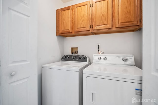 297 Kraemer Ct, East Brunswick, NJ 08816 - clothes washing area featuring cabinet space and independent washer and dryer