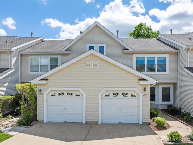 297 Kraemer Ct, East Brunswick, NJ 08816 - view of front of home featuring concrete driveway, a garage, and roof with shingles