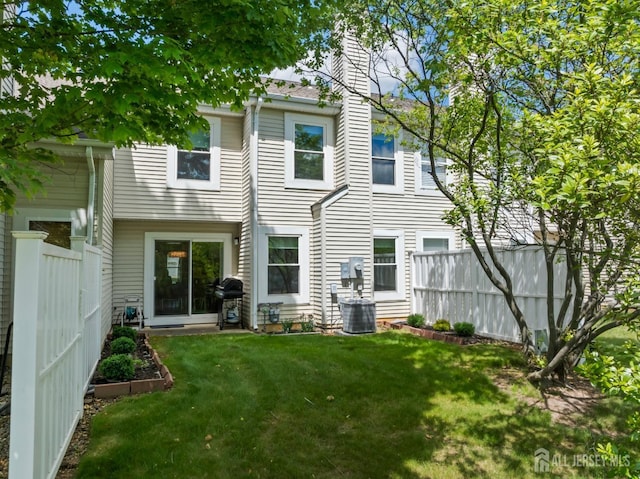 297 Kraemer Ct, East Brunswick, NJ 08816 - rear view of property featuring a chimney