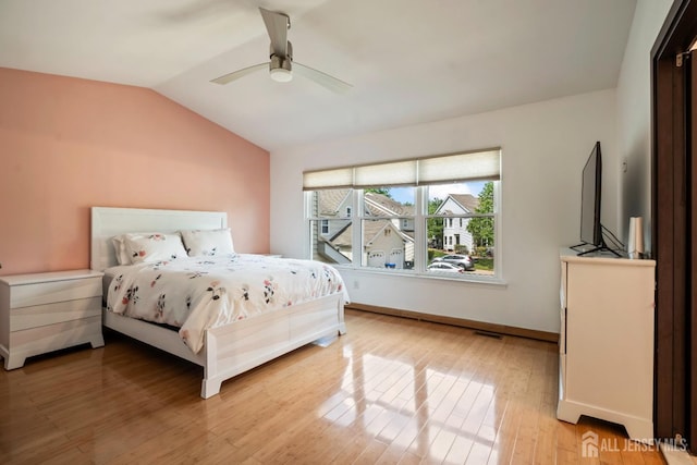 297 Kraemer Ct, East Brunswick, NJ 08816 - bedroom with lofted ceiling, light wood finished floors, a ceiling fan, and baseboards