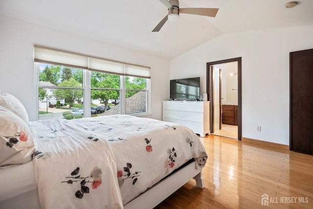 297 Kraemer Ct, East Brunswick, NJ 08816 - bedroom featuring vaulted ceiling, light wood finished floors, ceiling fan, ensuite bathroom, and baseboards