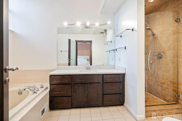 297 Kraemer Ct, East Brunswick, NJ 08816 - full bath featuring tiled shower, tile patterned floors, a garden tub, and vanity