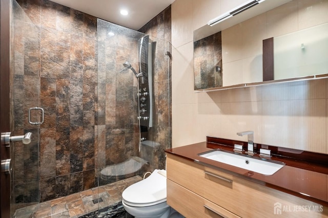 297 Kraemer Ct, East Brunswick, NJ 08816 - full bathroom with toilet, a shower stall, vanity, and tile walls